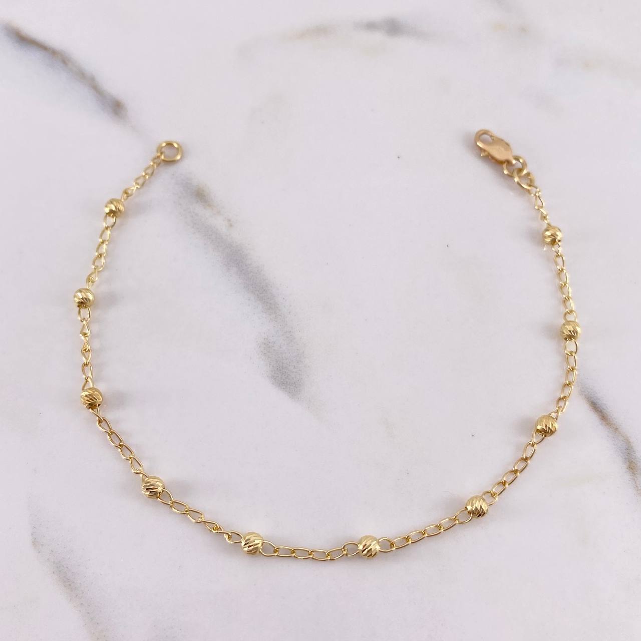 Pulso Tipo Militar 1.8gr / 18cm / 2.7mm Bolas Diamantadas Oro Amarillo 18K #