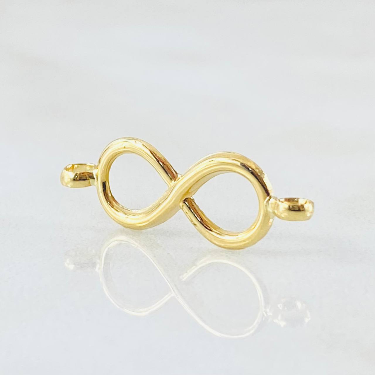 Herraje Infinito 0.4gr / 2.3cm / Oro Amarillo 18K