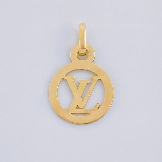 Dije Circulo Letra 0.5 g / 2 cm Oro Amarillo 18K