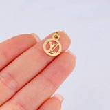Dije Circulo Letra 0.5 g / 1.9 cm Oro Amarillo 18K