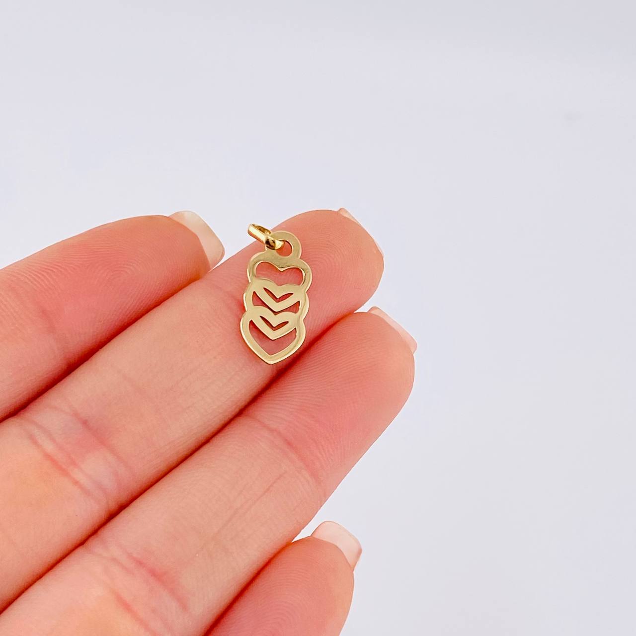 Dije Trio Corazones Silueta 0.55 g / 2.1 cm Oro Amarillo 18K