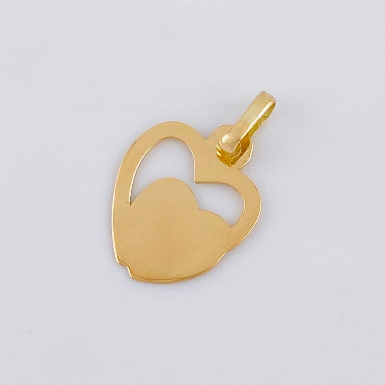 Dije Corazones Unidos 0.5 g / 1.8 cm Oro Amarillo 18K