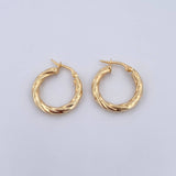 Candongas Kira 2.3gr / 2.2cm / Torcidas Oro Amarillo 18K $