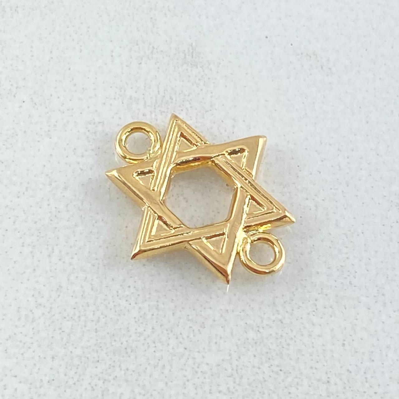 Herraje Estrella De David 0.6gr / 1.5cm / Oro 18K ©