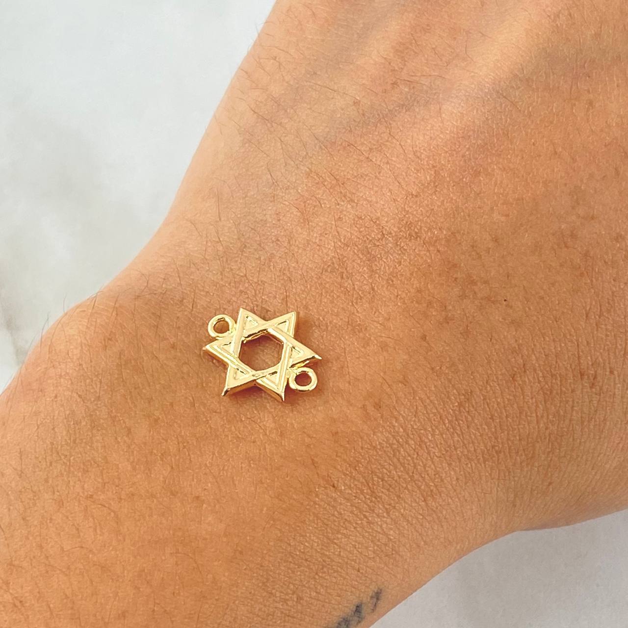 Herraje Estrella De David 0.6gr / 1.5cm / Oro 18K ©