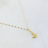 Set Cadena y Dije Mini Flor Espejo + Ancla  0.6gr / Oro Amarillo 18K ©