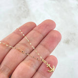 Set Cadena y Dije Mini Flor Espejo + Ancla  0.6gr / Oro Amarillo 18K ©