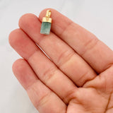Dije Morralla Esmeralda 0.8g / 1.7cm Oro Amarillo 18K