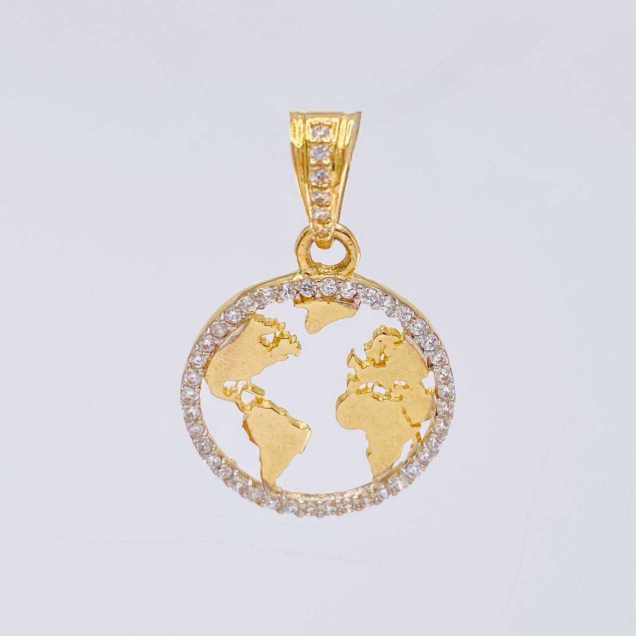 Dije Silueta Tierra 2 g / 2.3 cm Oro Amarillo 18K