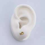 Topos Infinito 0.65gr / Circones Colores Oro Amarillo 18K &