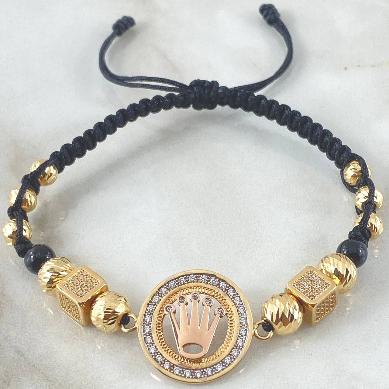 Pulsera Negra Herraje Corona 13.7gr / Oro 18K ©
