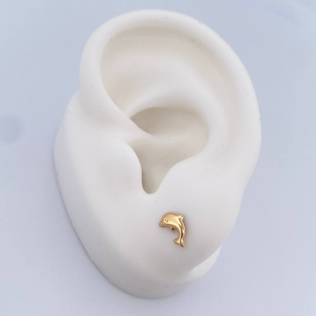 Topos Delfin 0.5gr / Oro Amarillo 18K $