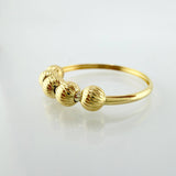 Anillo Bolas 1.05gr / T8 / Oro Amarillo 18K ©