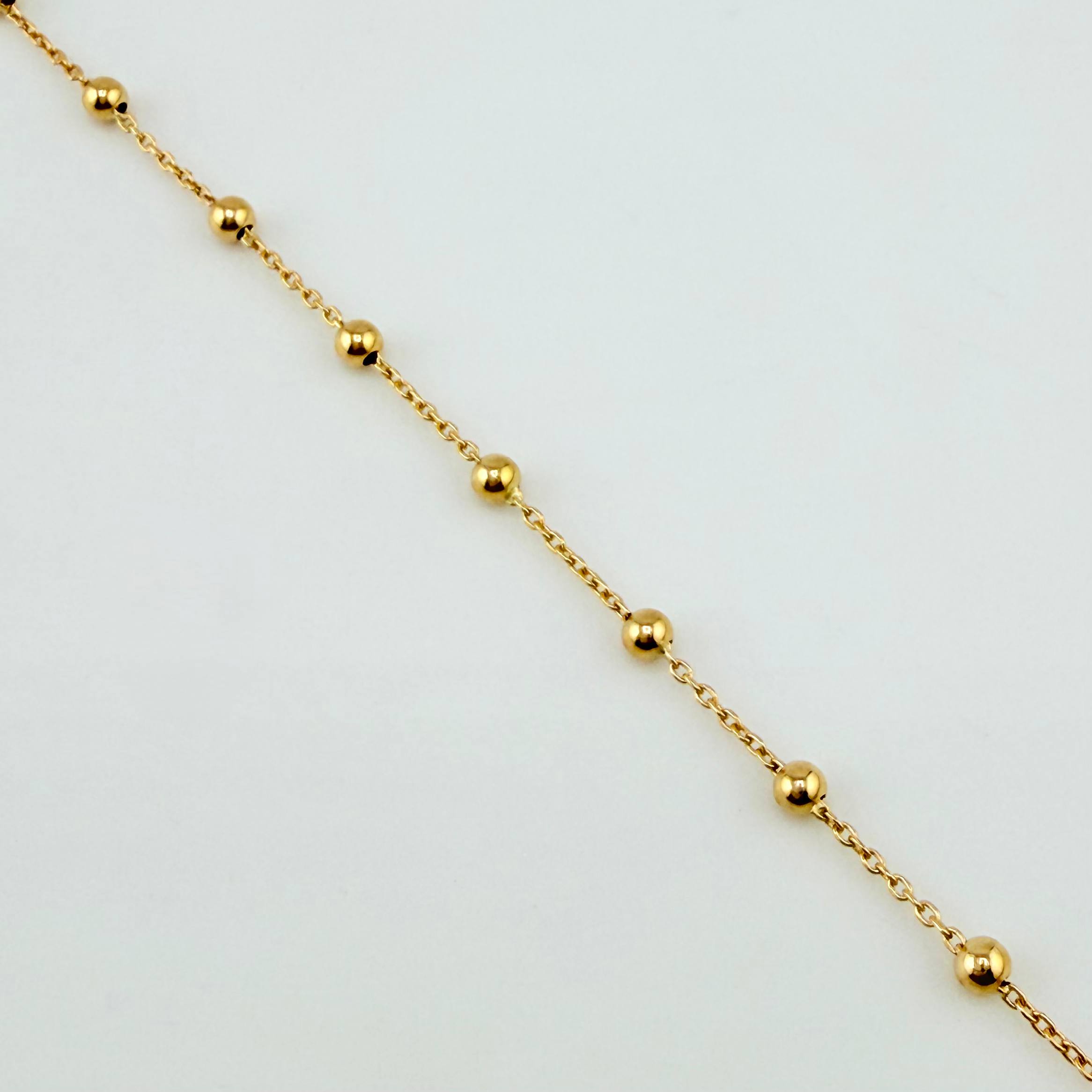 Tobillera Aro Seguido Dije Estrella 2.45gr / 25cm / 2.3mm Dos Oros Amarillo Blanco +4 18K