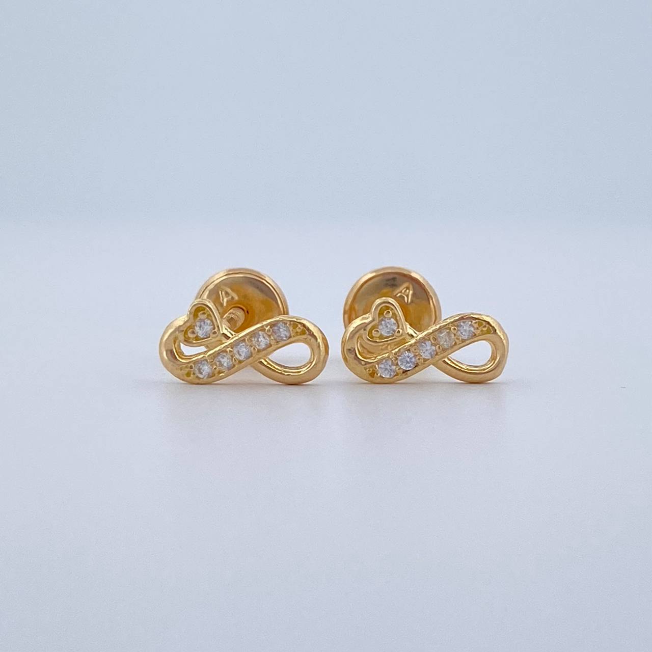 Topos Infinito 0.9gr / Oro 18K &