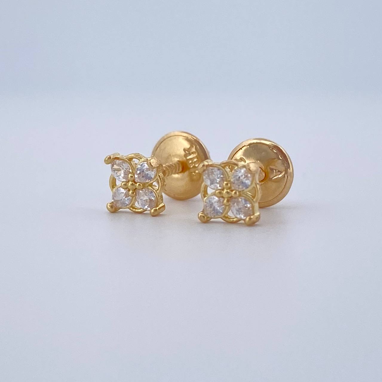 Topos Flor 0.65gr / Oro 18K &