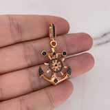 Dije Ancla Timon 5.3gr / 4.5cm / Circones Negros Oro Rosa 18K #