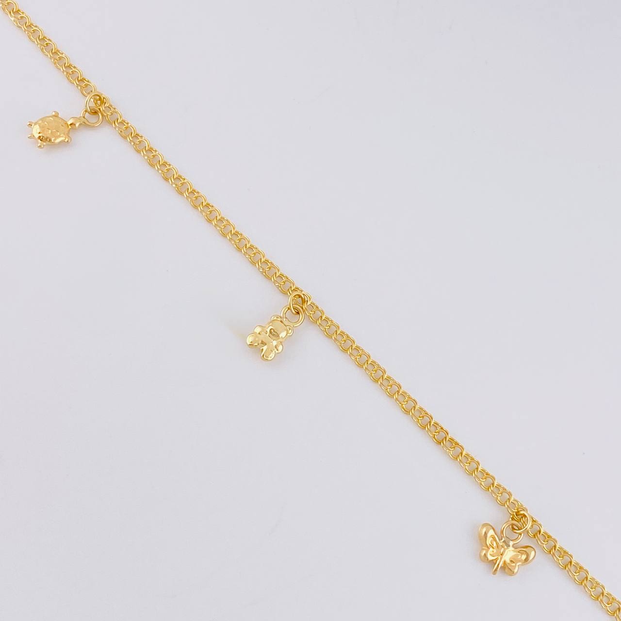 Tobillera Roll On Dijes 3.6 g / 25 cm / 2.3 mm Oro Amarillo 18K