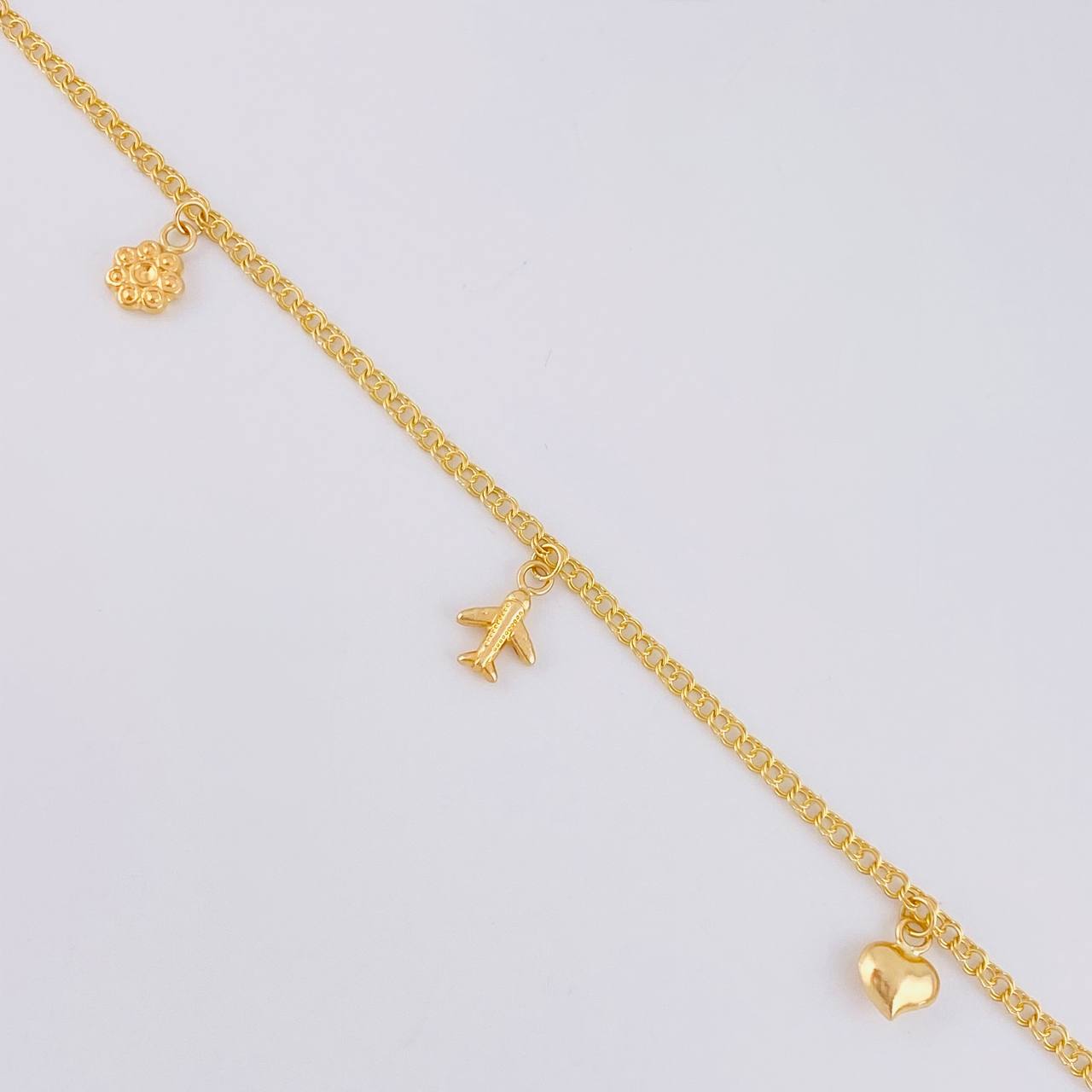 Tobillera Roll On Dijes 3.75 g / 24.8 cm / 2.3 mm Oro Amarillo 18K
