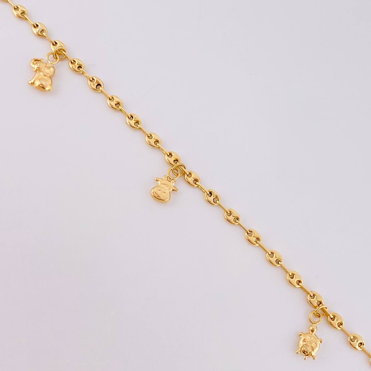 Tobillera Gc Dijes 4.05 g / 25.8 cm / 3.2 mm Oro Amarillo 18K