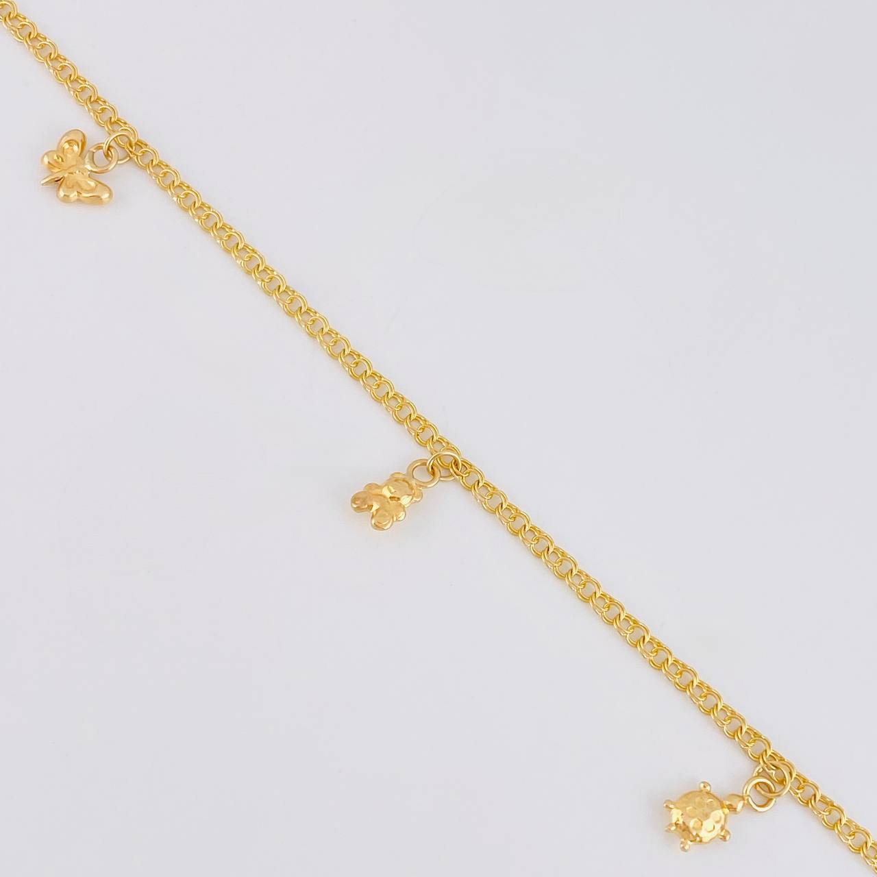Tobillera Roll On Dijes 3.65 g / 26.5 cm / 2.3 mm Oro Amarillo 18K