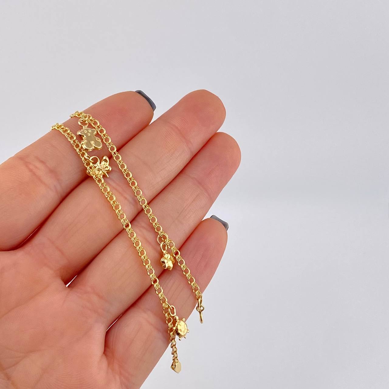 Tobillera Roll On Dijes 3.65 g / 26.5 cm / 2.3 mm Oro Amarillo 18K
