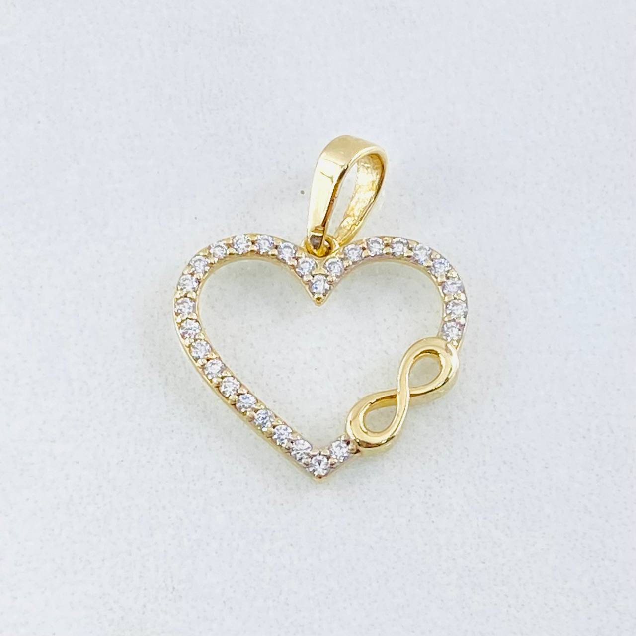 Dije Silueta Corazón Infinito 0.8gr / 2cm / Oro Amarillo 18K ©