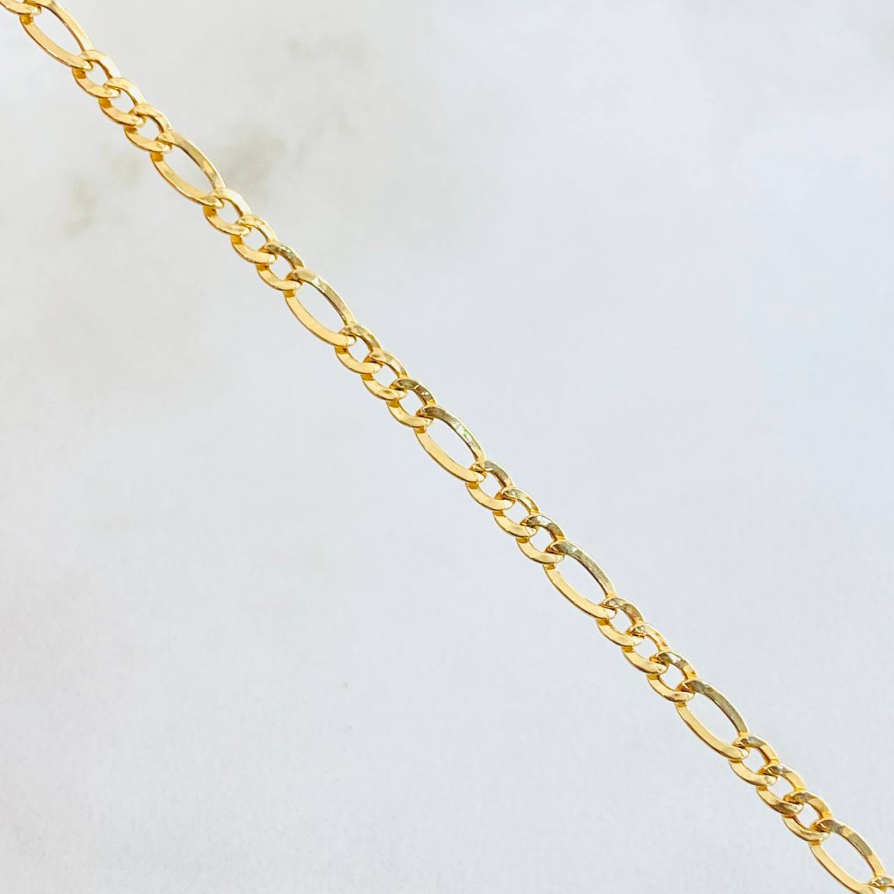 Cadena Figaro 2.25gr / 50cm / Oro Amarillo +1 18K ©