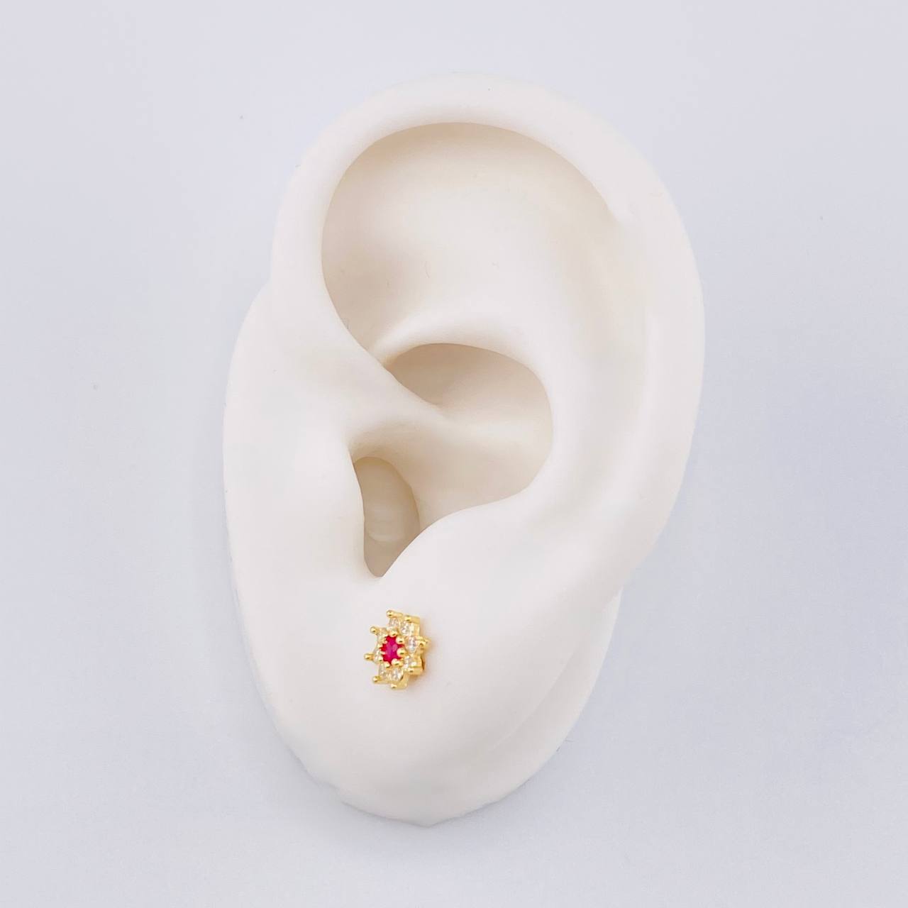 Topos Flor Estrellada 0.85 g / 6 mm Oro Amarillo 18K