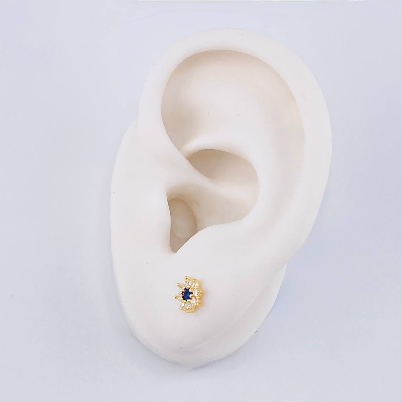 Topos Flor Estrellada 0.85 g / 6 mm Oro Amarillo 18K
