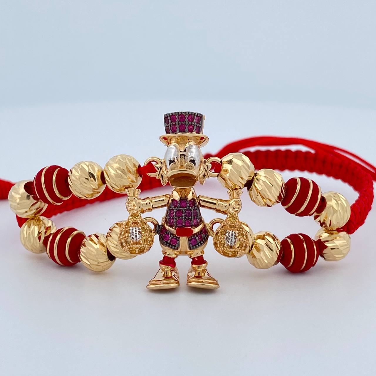 Pulsera Roja Pato Bolsas Dinero 8.4gr / Oro 18K $