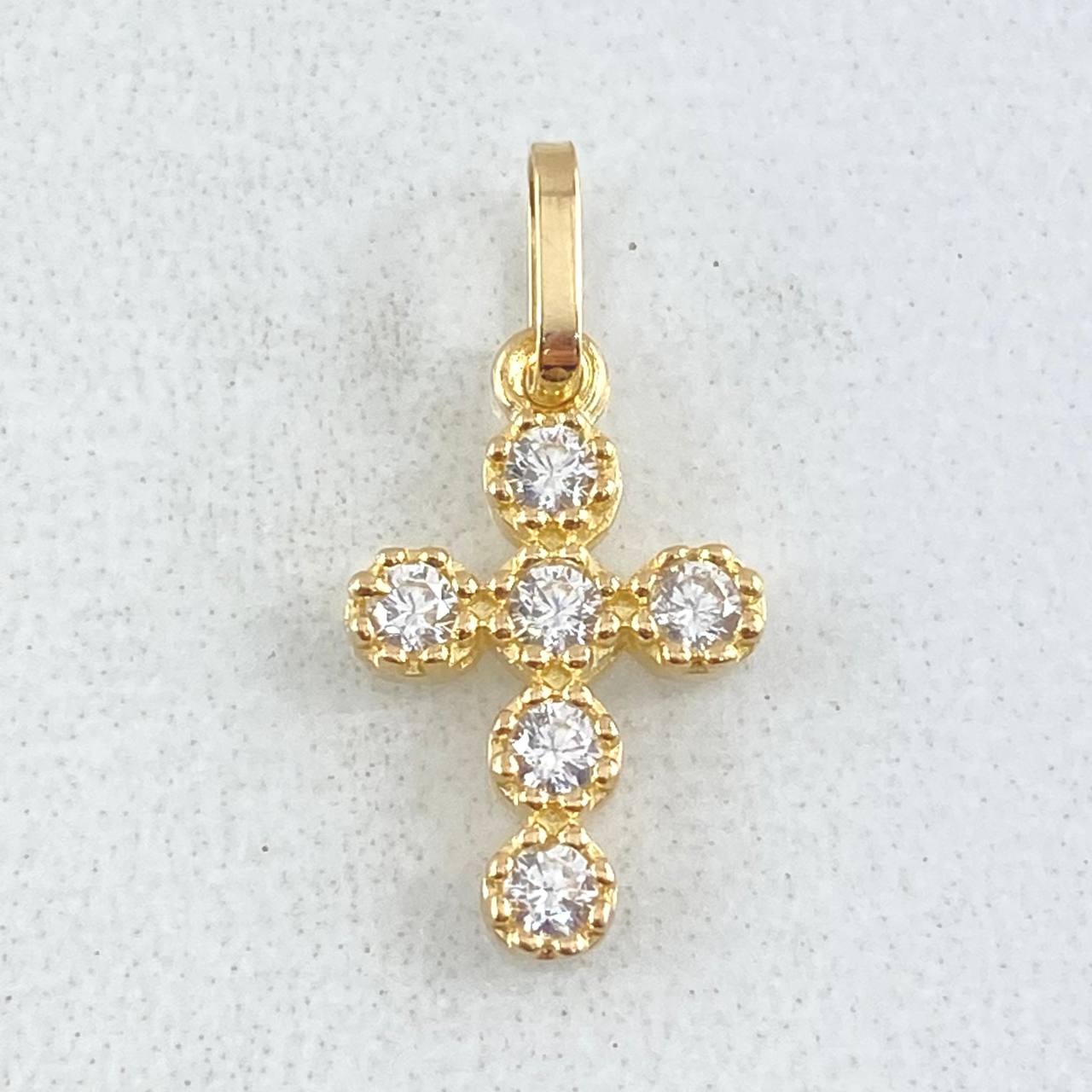 Dije Cruz 0.65gr / 1.8cm / Oro 18K