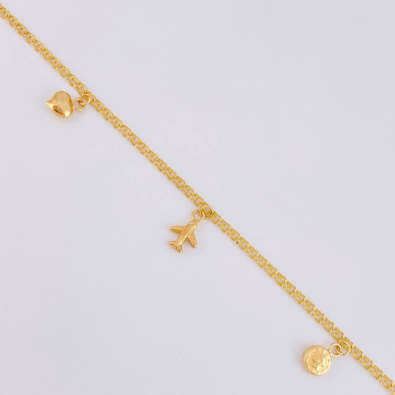 Tobillera Roll On Dijes 3.6 g / 25.5 cm / 2.3 mm Oro Amarillo 18K