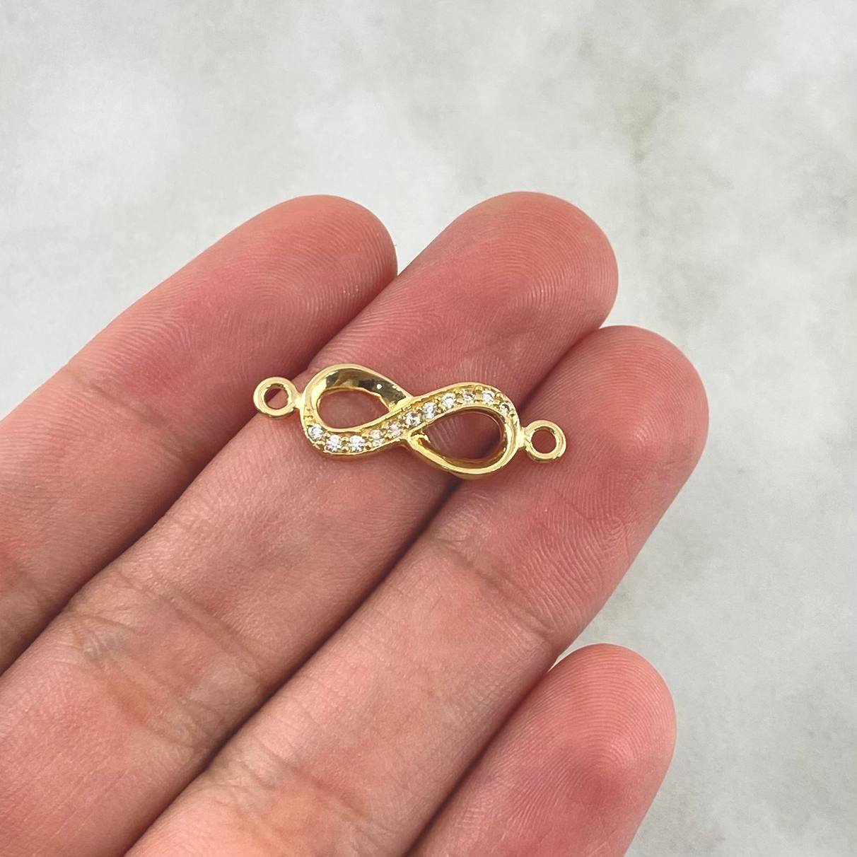 Herraje Infinito 1.05gr / 2cm / Circones Blancos Oro Amarillo 18K