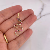 Dije Serpiente  1.7gr / 3.8cm / Circones Negros-Blancos-Fucsias Oro Amarillo 18K $