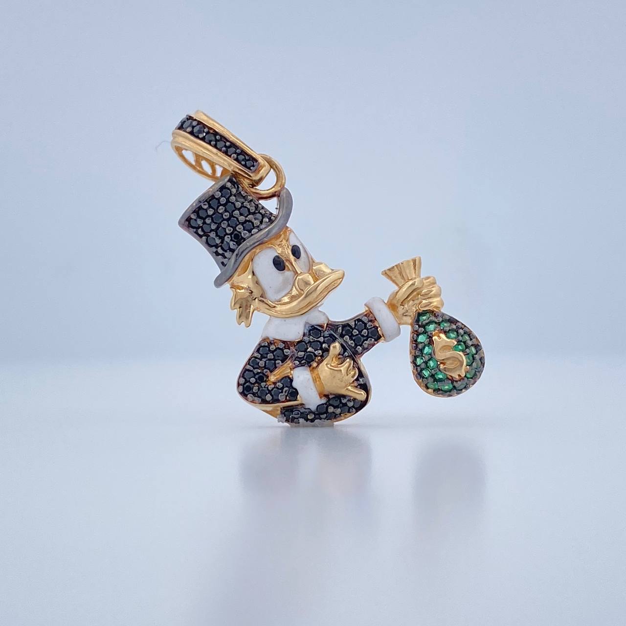 Dije Pato Inspirado Bolsa De Dinero 5.6gr / 3.7cm / Dos Oros Negro Amarillo 18K $