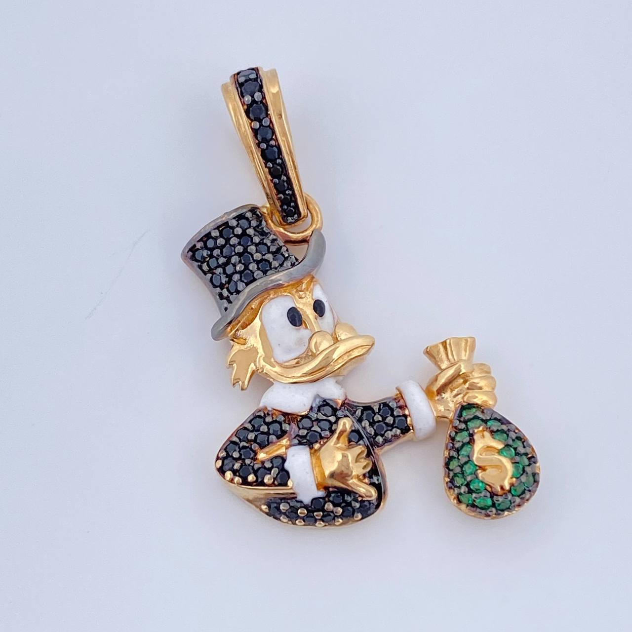 Dije Pato Inspirado Bolsa De Dinero 5.6gr / 3.7cm / Dos Oros Negro Amarillo 18K $