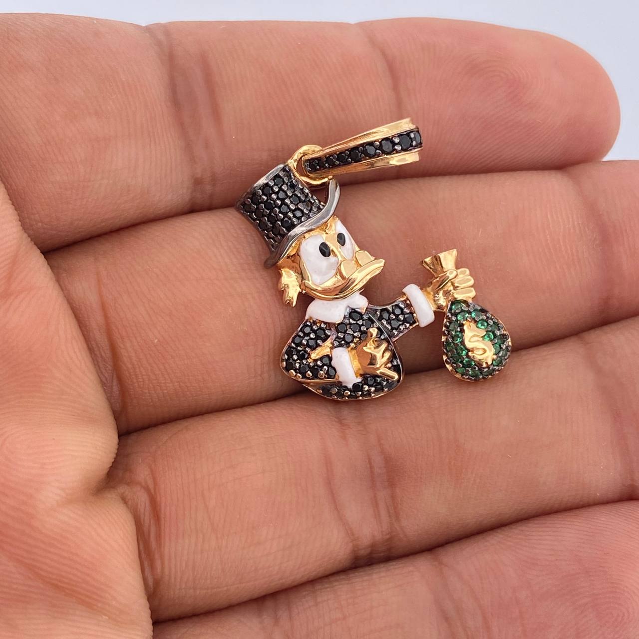 Dije Pato Inspirado Bolsa De Dinero 5.6gr / 3.7cm / Dos Oros Negro Amarillo 18K $