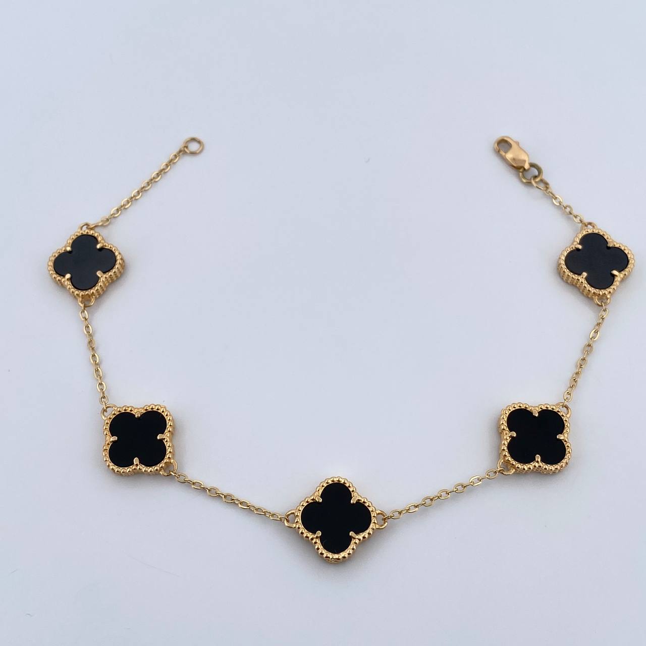 Pulso Aro Seguido Trebol Gradual 8.15gr / 17.2cm-19.5cm / 1.2mm Onix Negro Oro Amarillo Nac.Esp. 18K $