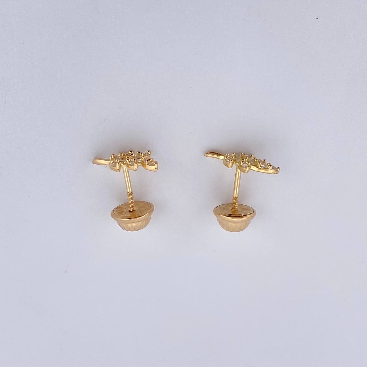 Topos Hojas 0.75gr / Circones Blancos Oro Amarillo 18K $