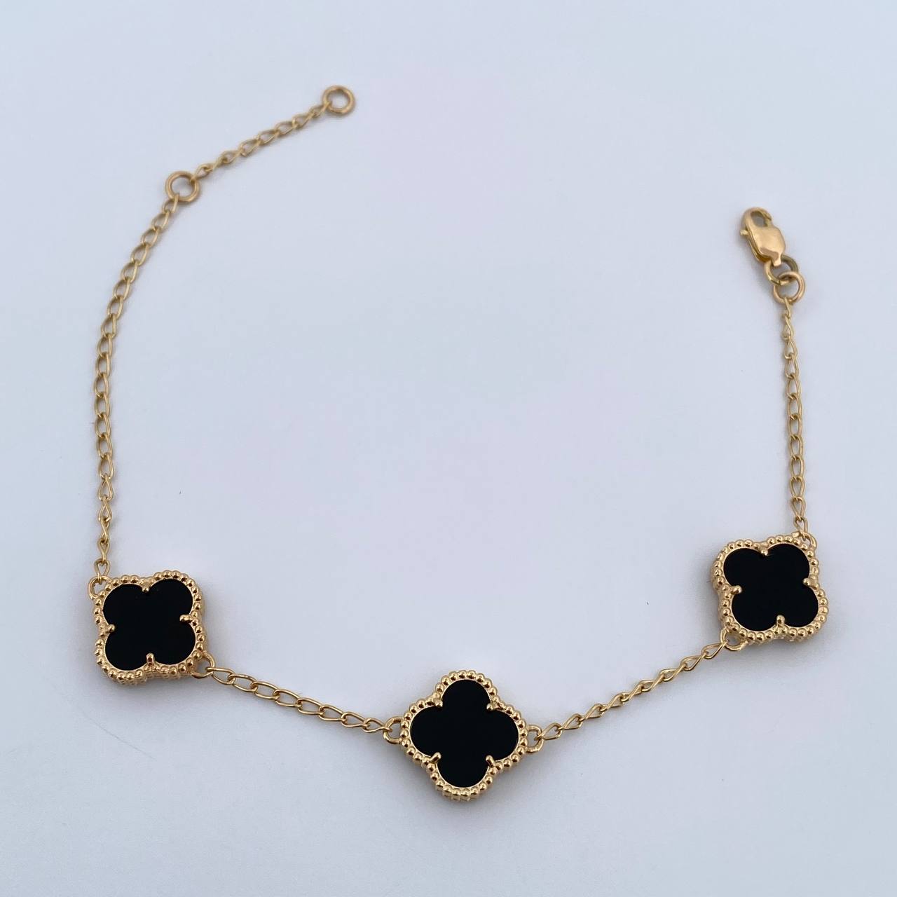 Pulso Espiga Trebol Gradual 5.55gr / 17.1cm-19.2cm / 1.3mm Onix Negro Oro Amarillo Nac.Esp. 18K $