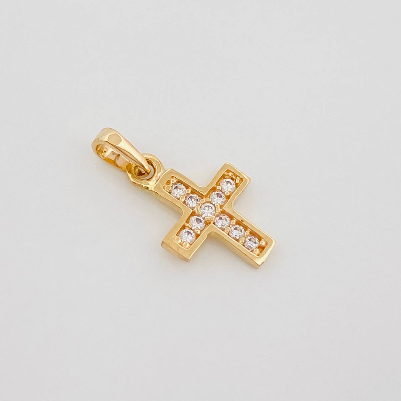 Dije Cruz 0.7 g / 1.5 cm Oro Amarillo 18K