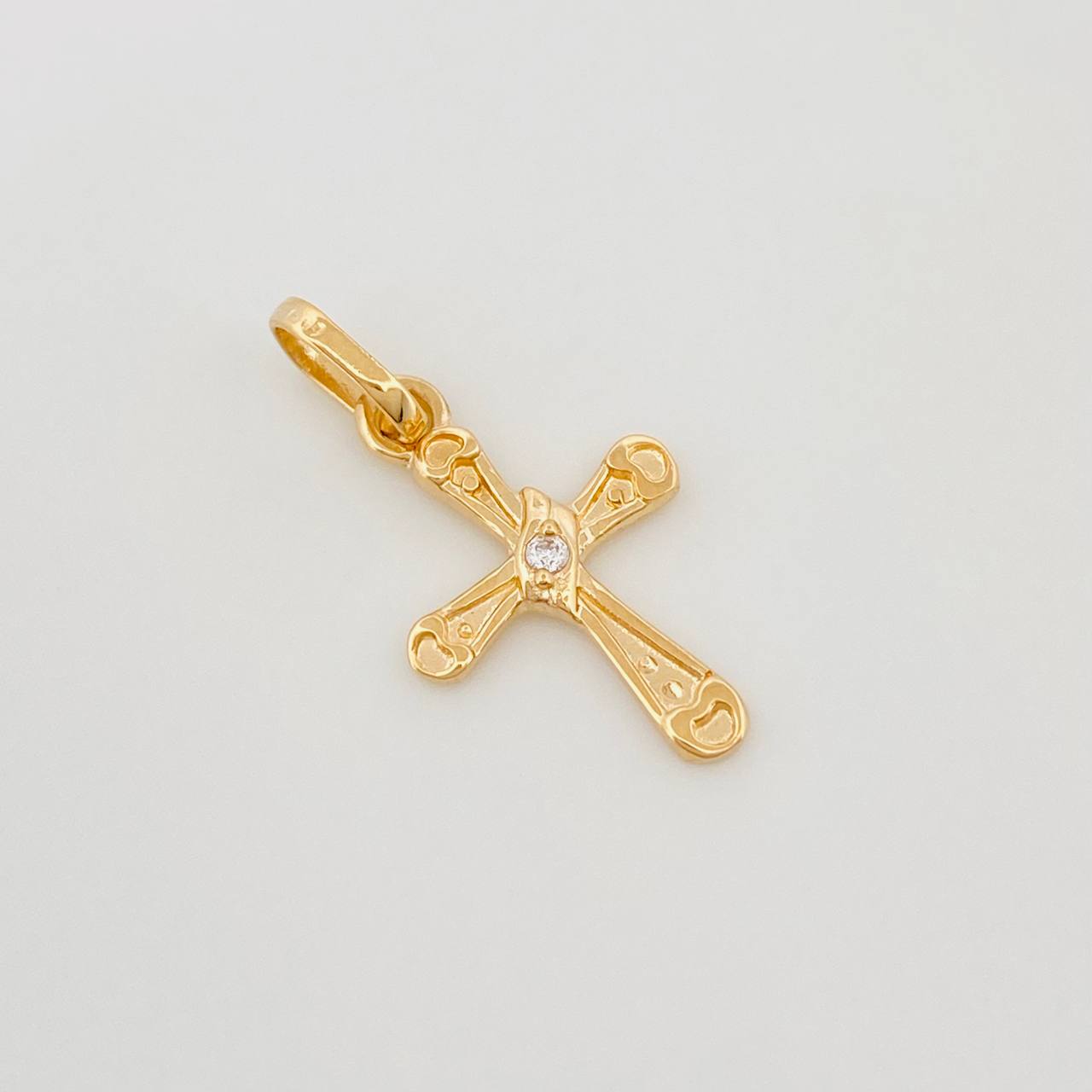 Dije Cruz 0.85 g / 1.5 cm Oro Amarillo 18K