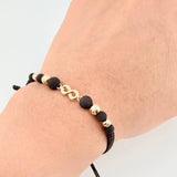 Pulsera Tejida Negra Herraje Infinito Bolas Diamantadas 4Mm-5Mm / 4 Und Oro Amarillo 18K