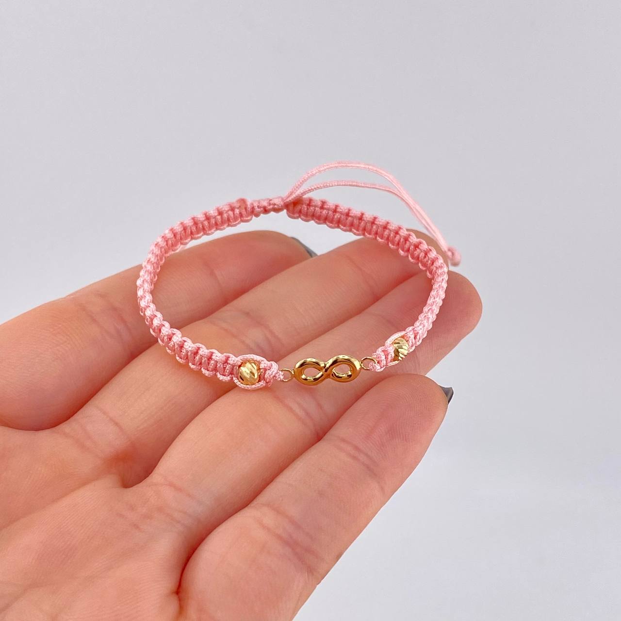 Pulsera Tejida Rosada Herraje Infinito Bolas Diamantadas 4Mm / 2 Und Oro Amarillo 18K