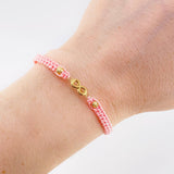 Pulsera Tejida Rosada Herraje Infinito Bolas Diamantadas 4Mm / 2 Und Oro Amarillo 18K