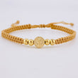 Pulsera Tejida Cafe Herraje San Benito Bolas Lisas 4Mm / 4 Und Oro Amarillo 18K