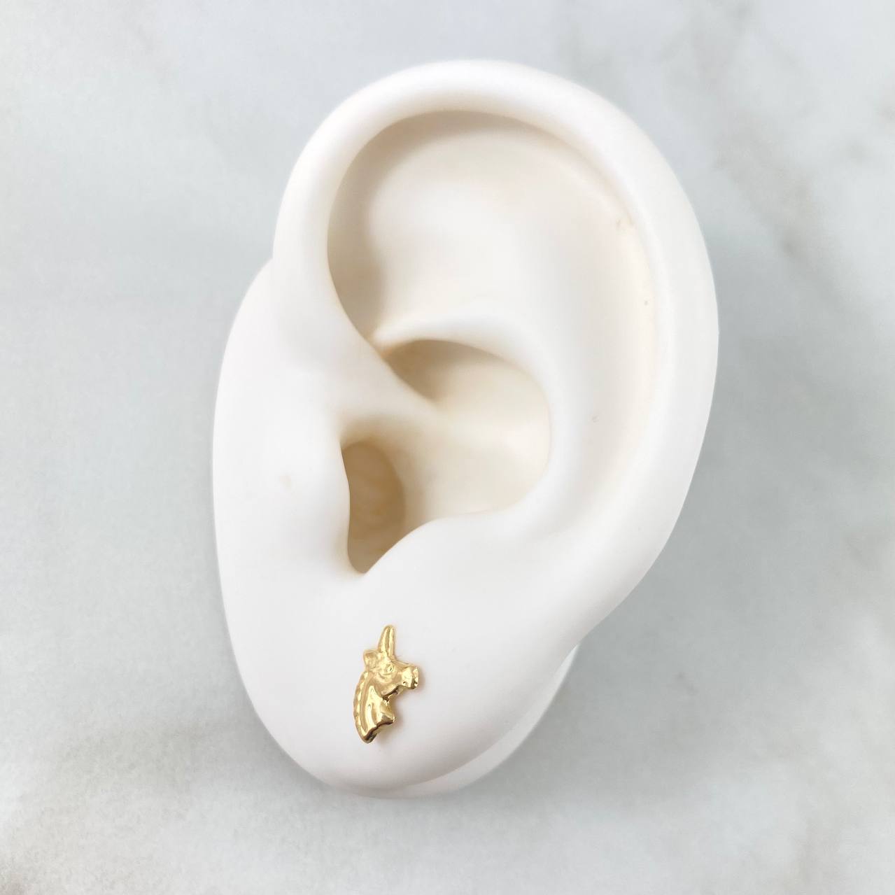 Topos Cabeza Unicornio 0.6gr / 7mm Oro Amarillo 18K
