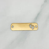 Herraje Placa Huellitas 0.75 g / 2.5 cm Oro Amarillo 18K