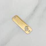 Herraje Placa Huellitas 0.75 g / 2.5 cm Oro Amarillo 18K